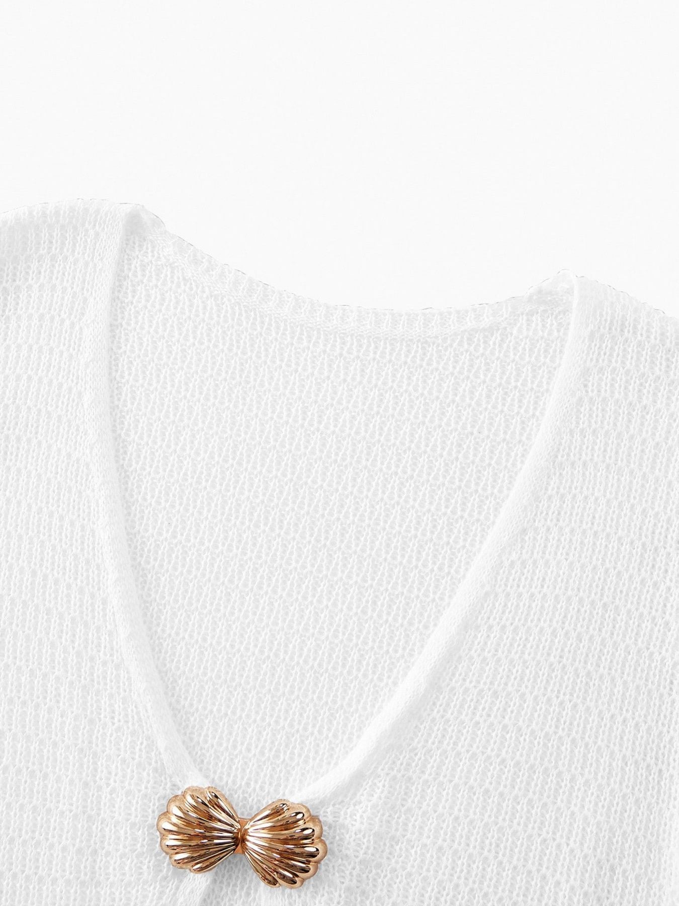 White crochet knit cover-up with V-neck and shell detail