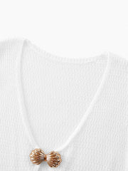 White crochet knit cover-up with V-neck and shell detail