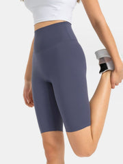 Sculpted Contour Active Cycling Shorts in Dusty Blue, high-waisted, mid-thigh length.