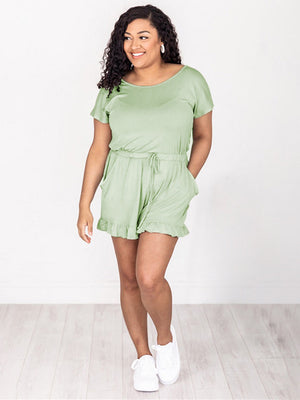 Gum Leaf off-shoulder romper with ruffle hem and drawstring waist.