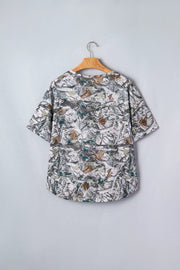 Earthy camouflage print henley t-shirt with short sleeves and a buttoned neckline.