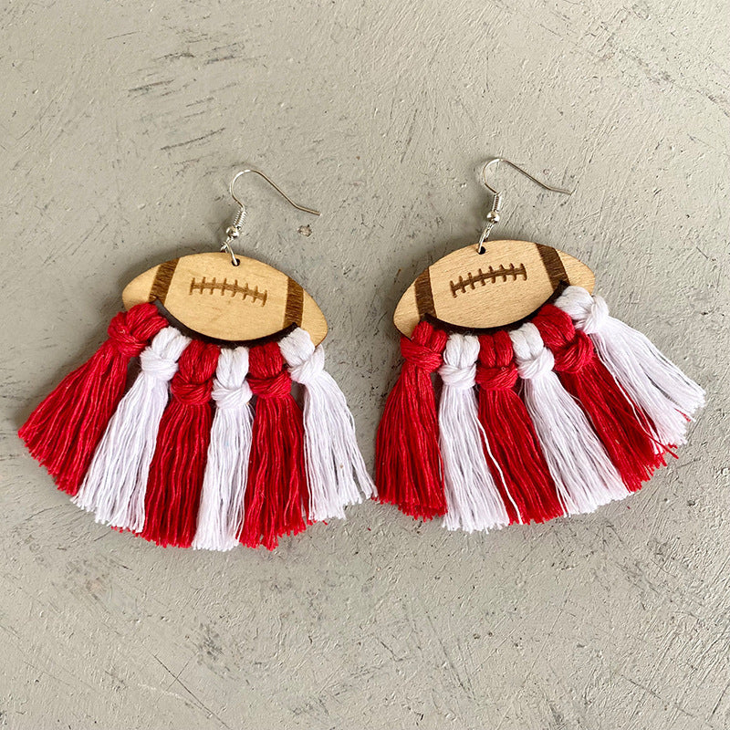 Macrame football tassel earrings in red and white with wooden football tops.