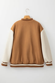 Brown corduroy bomber jacket with sherpa sleeves and striped ribbing.