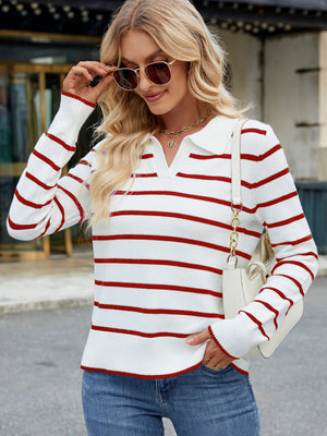 Polo-neck knit top with red Breton stripes, long sleeves, and a collared neckline.