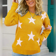 Yellow acrylic crewneck sweater with white and pink stars, long sleeves.