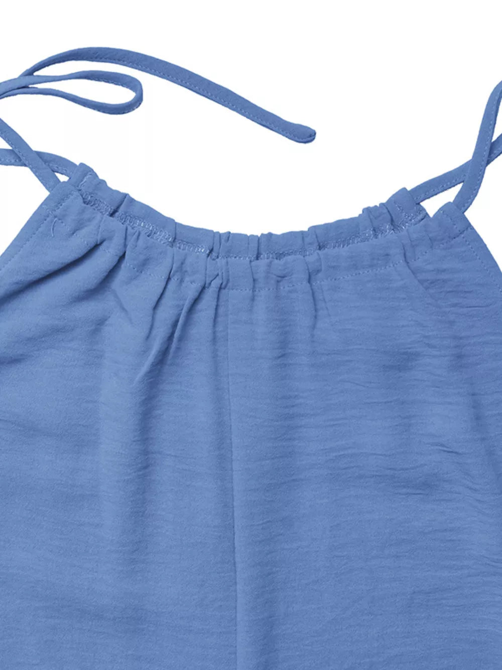 Blue tie-strap romper with ruffled neckline detail