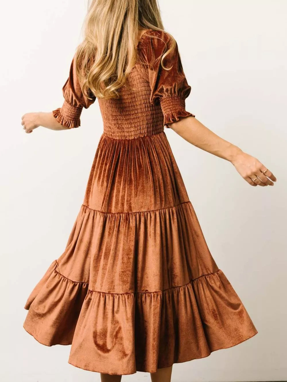 Caramel velvet midi dress with smocked bodice and ruffled puff sleeves