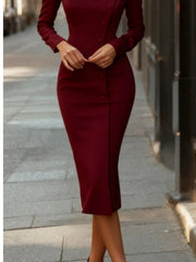 Burgundy button front long-sleeve midi dress with asymmetrical button detail.