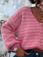 Pink and cream striped knit cropped cardigan with buttons.