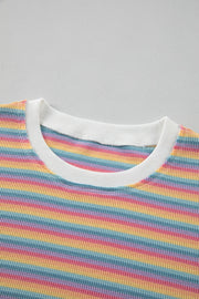 Rainbow stripe cotton loungewear set with white crew neck and ribbed trim.