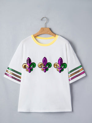 White maternity t-shirt with sequin fleur-de-lis and striped sleeves.