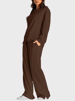 Brown loungewear set with crew neck sweatshirt and slit-front wide-leg trousers.