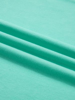 Eyelet lace ruffled cap sleeve top in mint green fabric detail