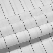 White pinstripe fabric detail of a wide-leg romper