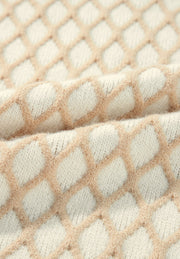 Cream diamond knit sweater with balloon sleeves, acrylic fabric detail