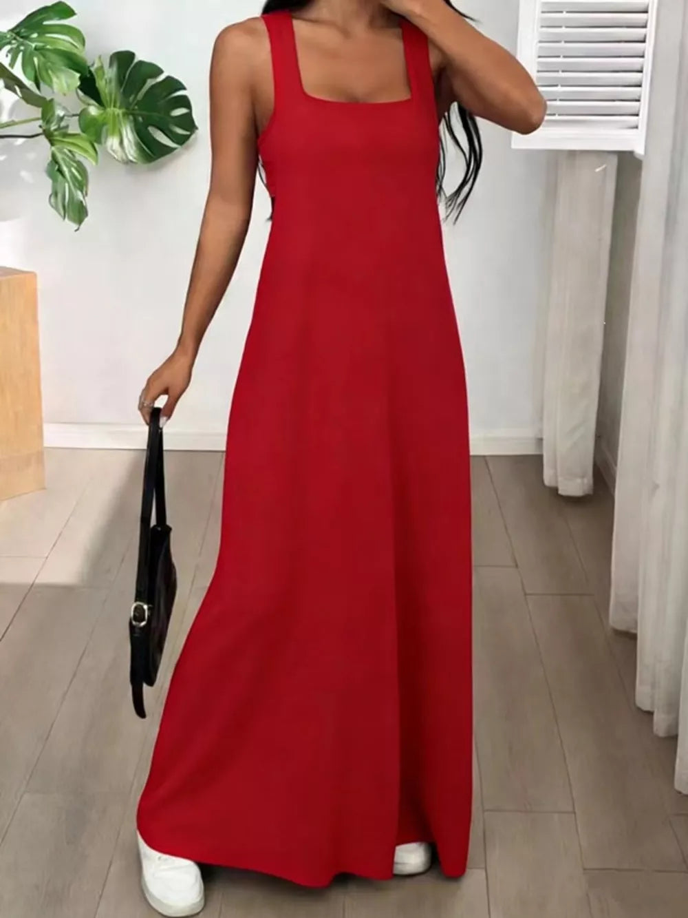 Red scoop neck cami maxi dress with a relaxed fit and square neckline.