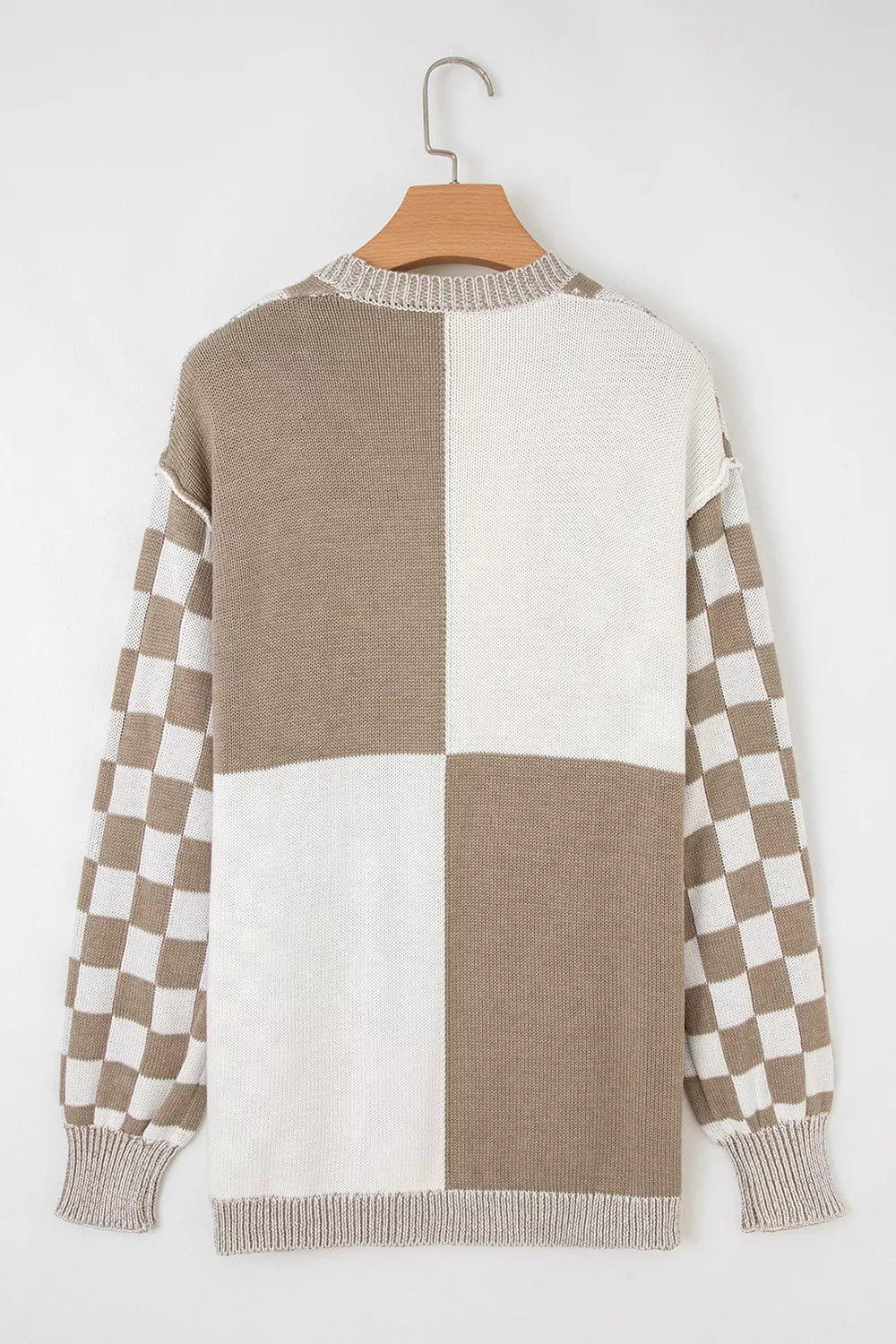 Checkerboard knit cardigan with ribbed details in brown and white acrylic, featuring a large checkerboard body and checkered