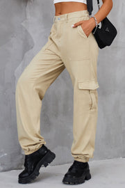 Tan utility cargo trousers with elasticated cuffs and side pockets.