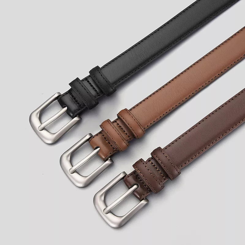 Timeless cowhide leather belts in black, brown, and khaki with silver buckles.