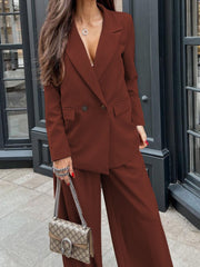Brown double-breasted blazer and wide leg trousers suit with button detail.