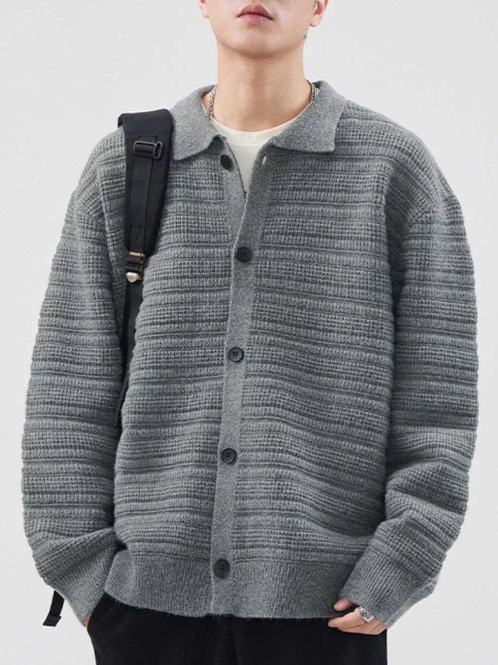 Men's gray ribbed knit button-down cardigan with a collar, acrylic material.