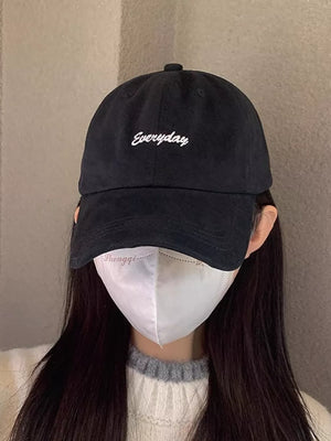 Black cotton baseball cap with white "Everyday" embroidery.