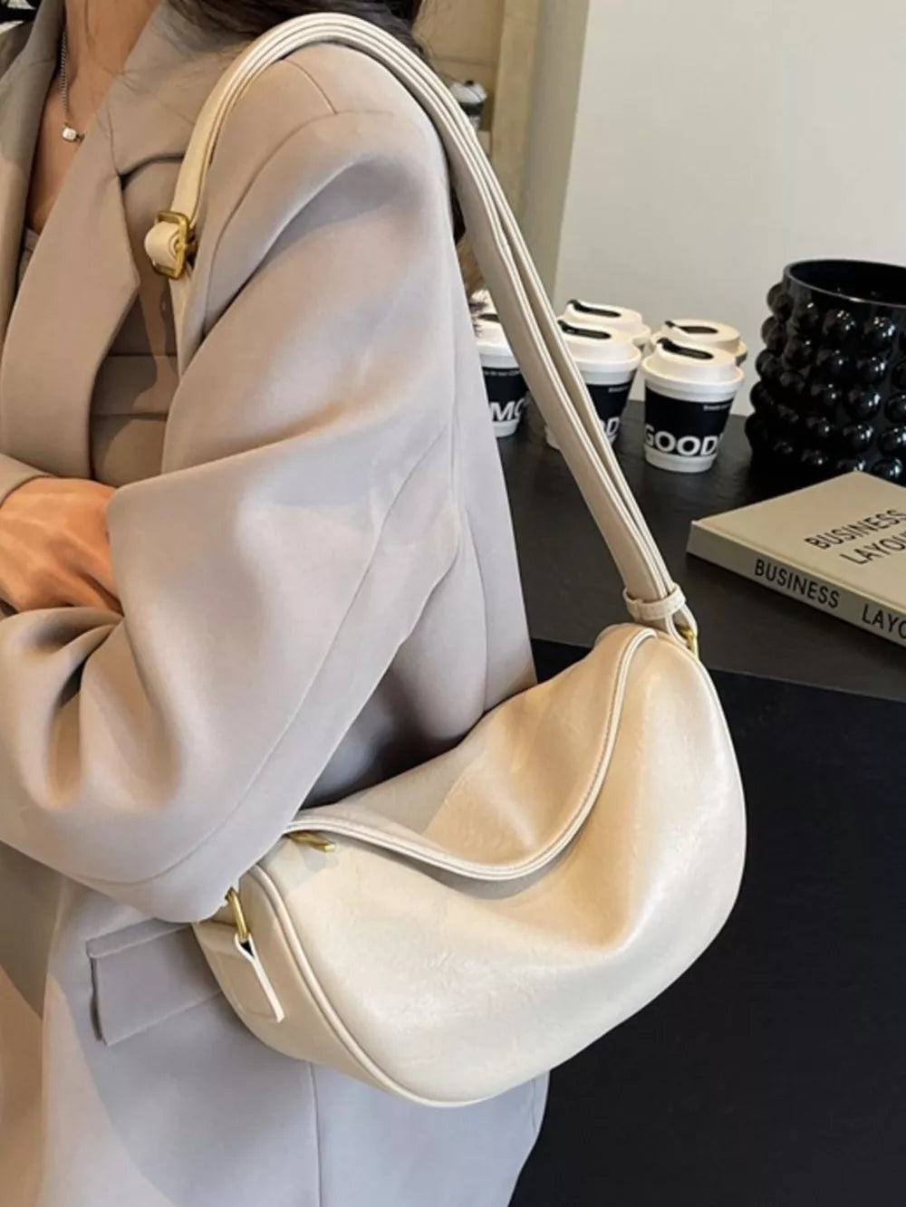 Adjustable Strap Crossbody Bag in Black, model styling view