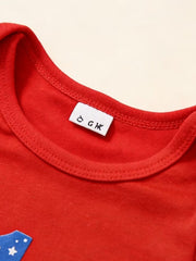 Red baby outfit with patriotic star detail and care tag.