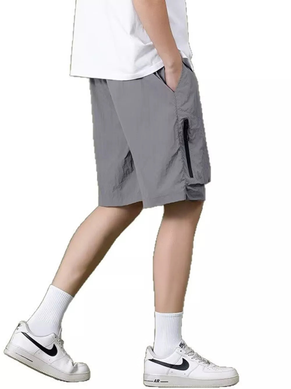 Grey lightweight cargo shorts with zippered pockets and drawstring waist.