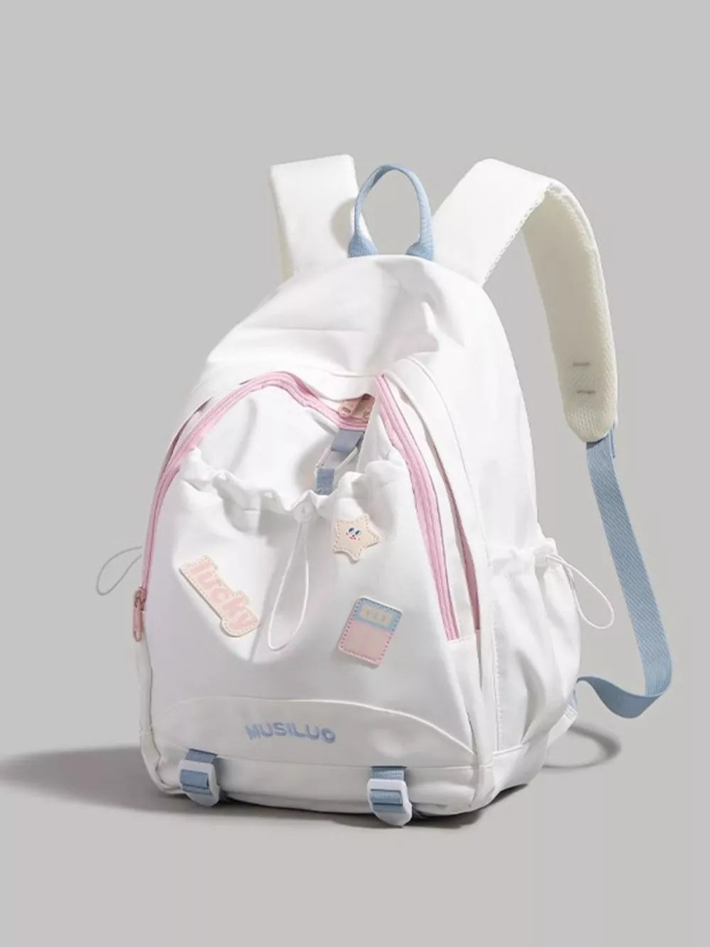 White drawstring backpack with pink accents and cute patches, adjustable blue straps