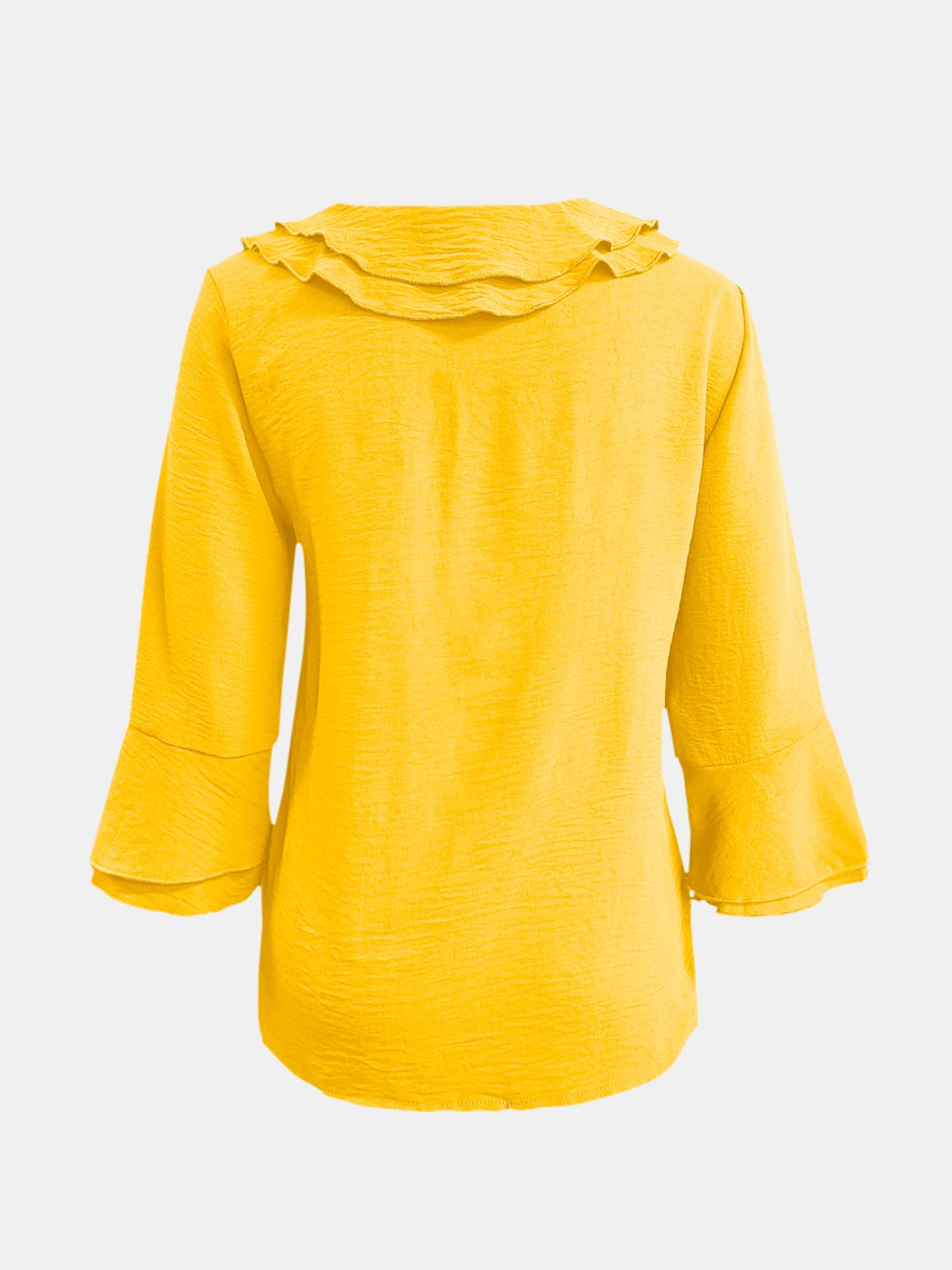 Yellow linen blouse with ruffled neckline and flared sleeves.