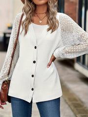White waffle knit cardigan with button front and lace sleeves.
