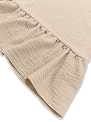 Beige mini dress with ruffled hem detail and textured fabric.