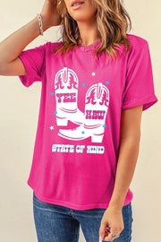 Hot pink t-shirt with white cowboy boots graphic and text Yee Haw State of Mind