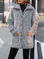 Teddy bear textured button-down coat in grey with pockets and button closure.