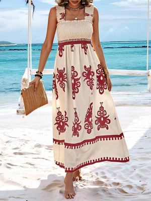 Maxi dress with smocked bodice, square neck, and tribal print skirt.