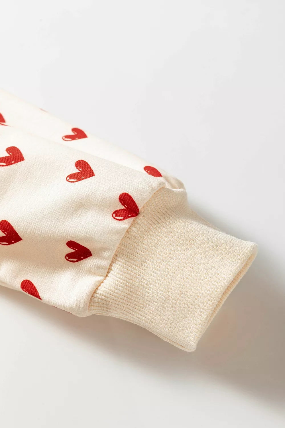 Heart Print Round Neck Long Sleeve Sweatshirt in Cream, back view