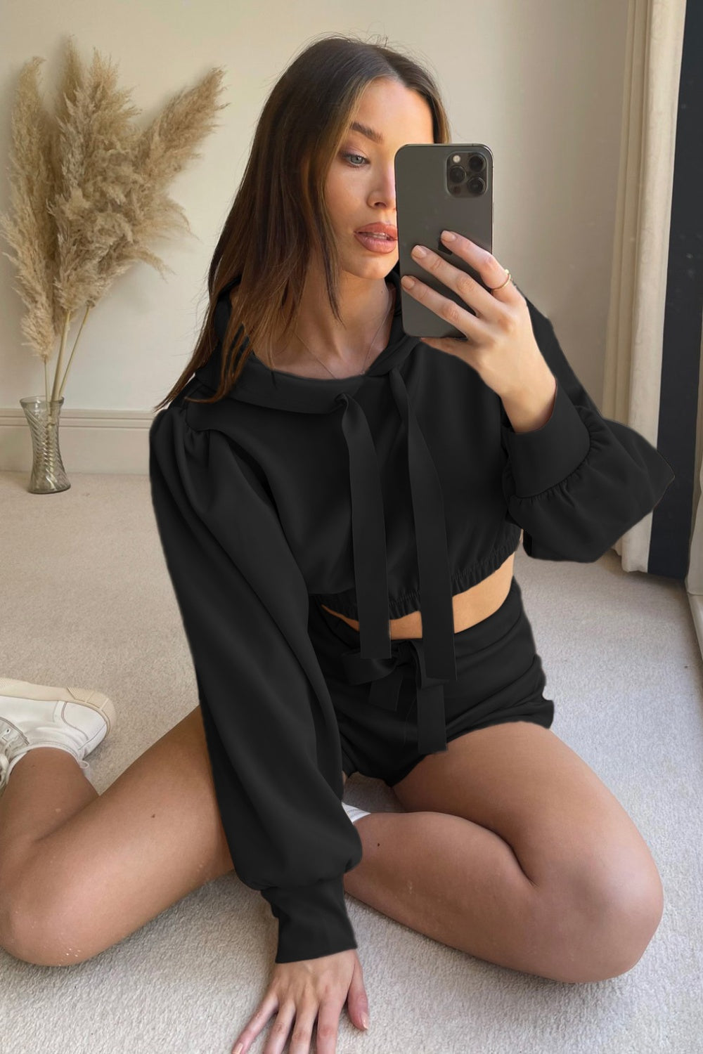 Black cropped hoodie with tie detail and matching shorts set