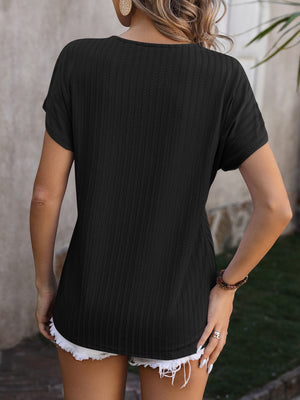 Black textured short sleeve tee with a V-neck and ribbed detail.
