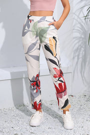 Botanical print slim-fit trousers in floral pattern.