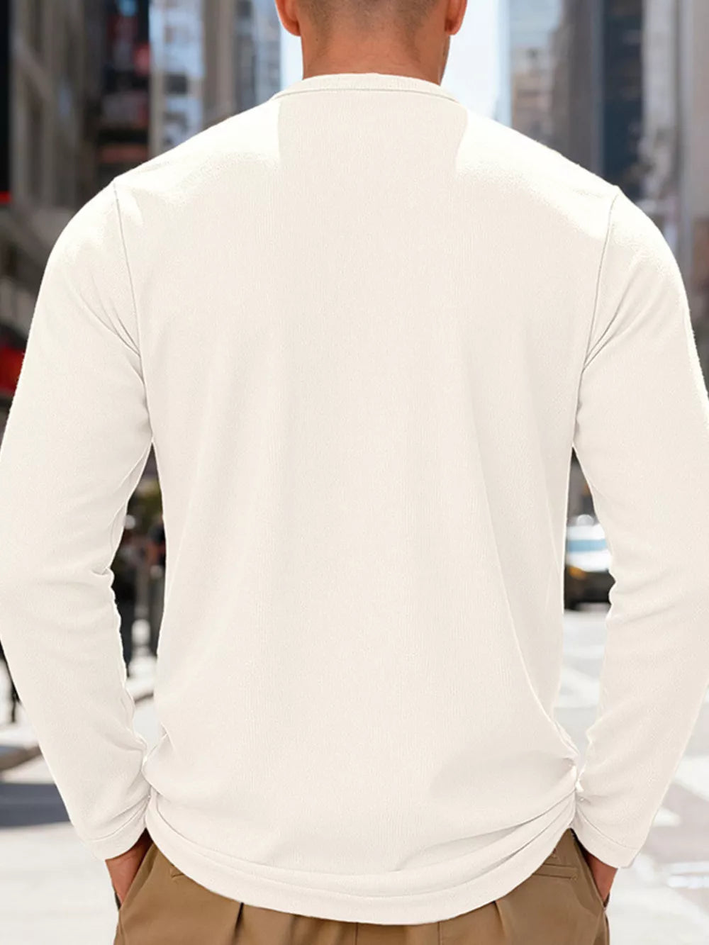 Men's long sleeve cotton Henley t-shirt in white, showing the back view.