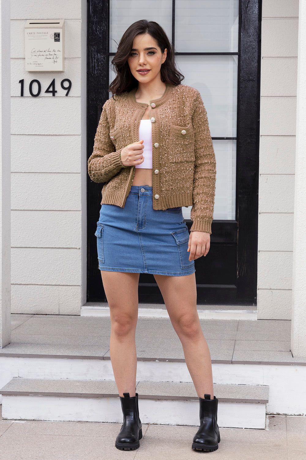 Khaki bouclé knit bolero jacket with gold buttons and pockets, crew neck, long sleeves.