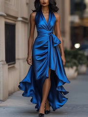 Blue satin high-low ruffled maxi dress with cinched waist and bow detail.