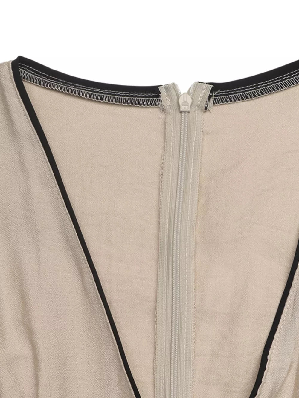 Beige maxi dress with black piping and a zipper detail.