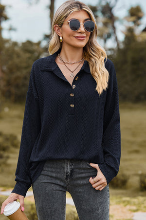 Textured polo-neck sweater in dark blue with button detail and long sleeves.