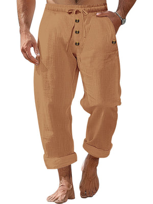 Relaxed fit cotton sweatpants in Earthy Yellow with drawstring and button-fly detail.