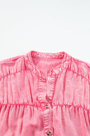 Acid wash dusty pink ruffle shirt dress with button front and tiered skirt detail.