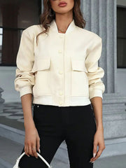 Cream utility pocket bomber jacket with button front and ribbed cuffs.