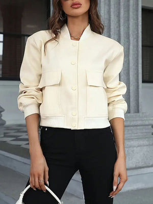 Cream utility pocket bomber jacket with button front and ribbed cuffs.