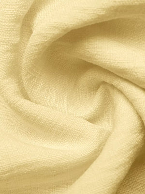 Peplum hem two-piece set in cream textured fabric with button detail.